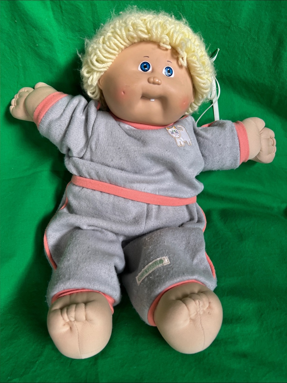 Vintage Cabbage Patch Kids Doll in Light Gray Outfit with Blonde Hair.